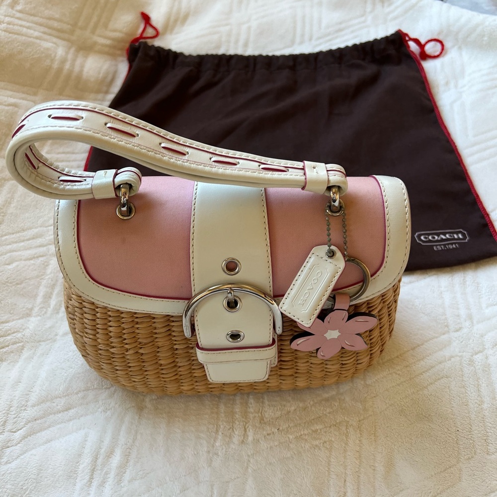 Pink linen, white leather, and woven Coach handbag